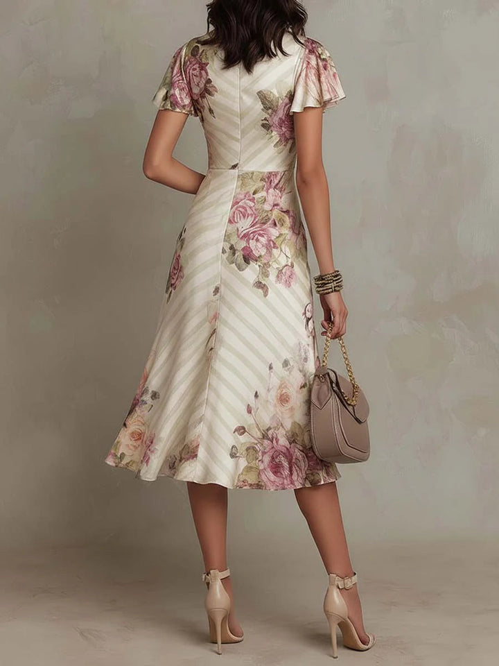 Cherise | Elegante abito midi in raso con stampa floreale in stile retrò