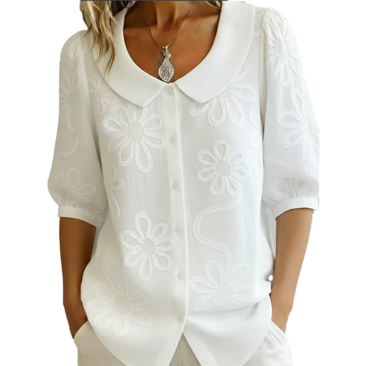 Camille | Camicia con colletto retrò e motivi floreali.